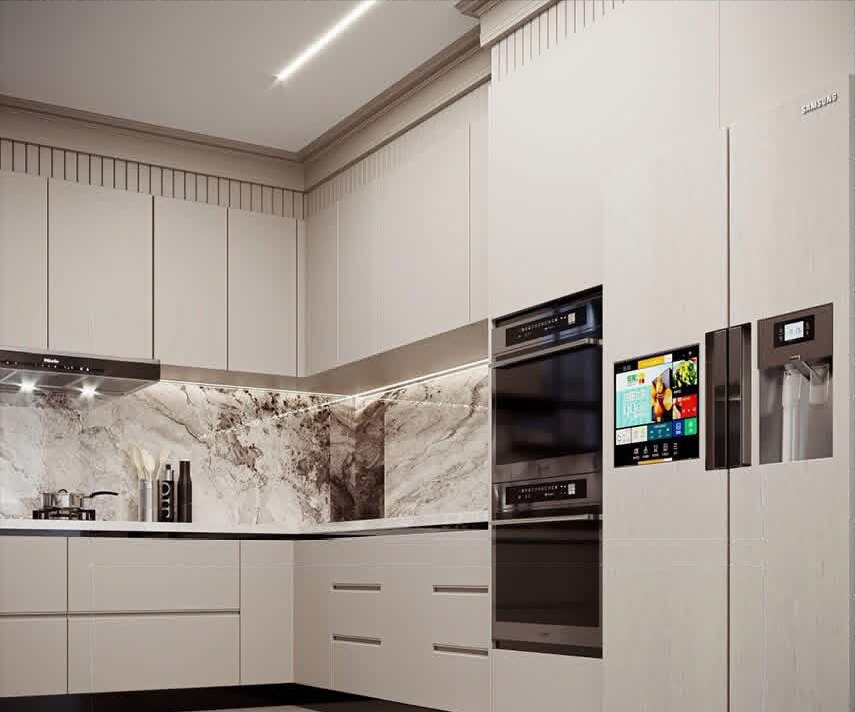 L‑shaped kitchen with tall appliance wall