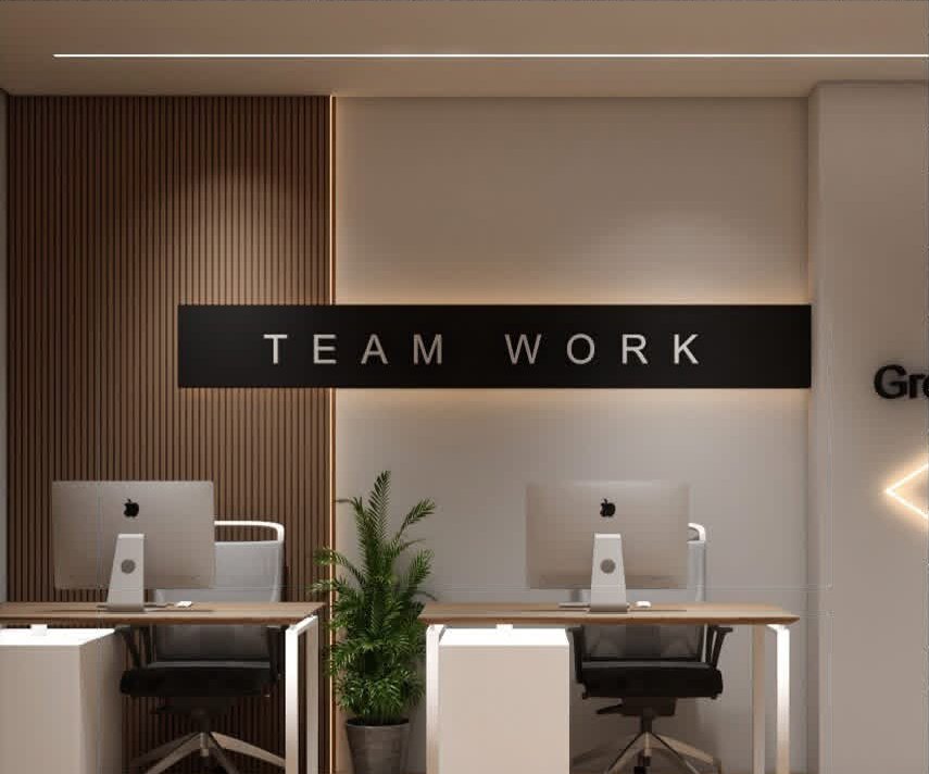 Team workspace with fluted walnut wall and backlit sign